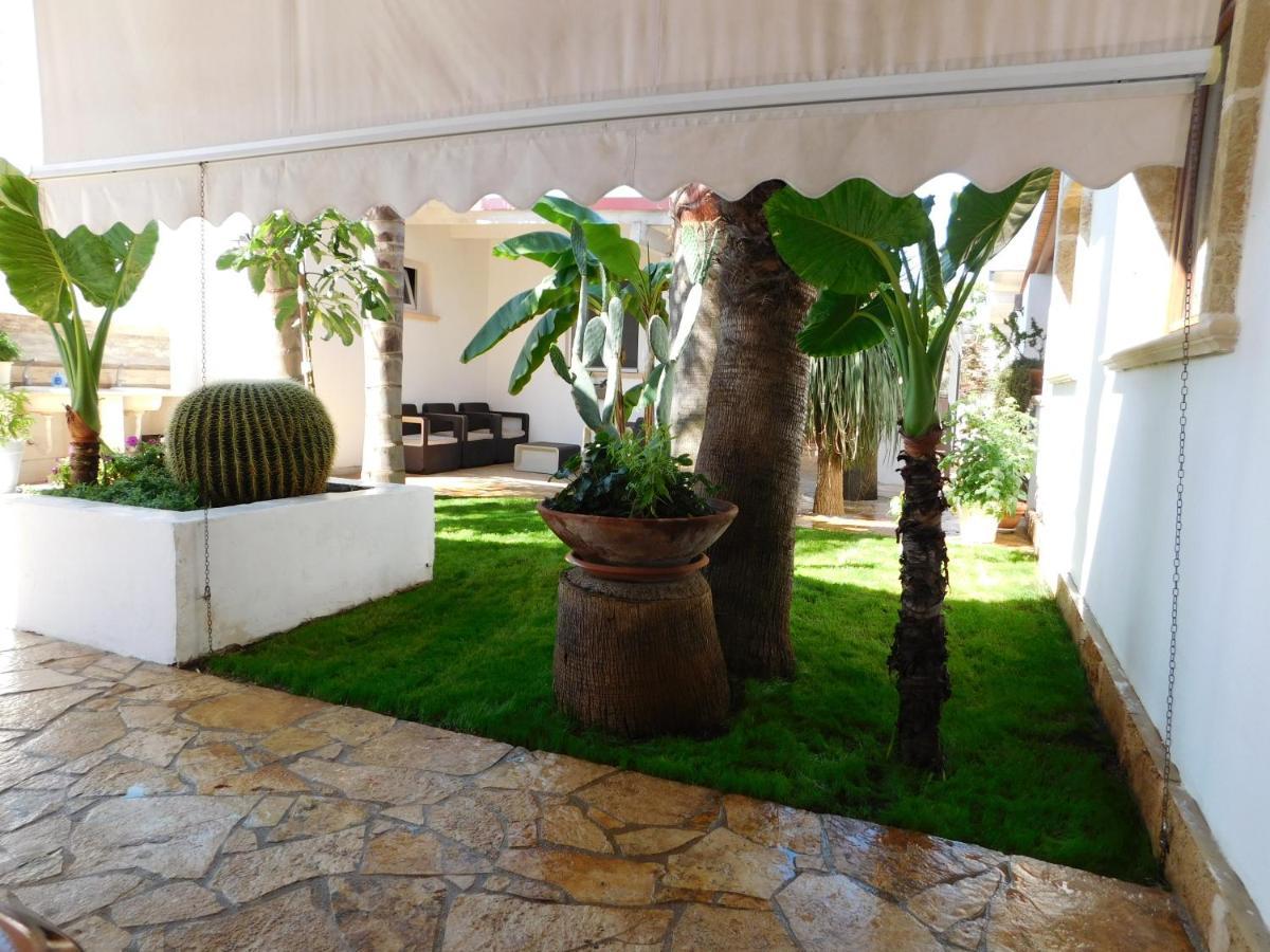 بورتو سيساريو Villa Raggio Di Sole Parcheggio Privato المظهر الخارجي الصورة
